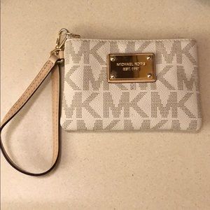 White Michael Kors wristlet